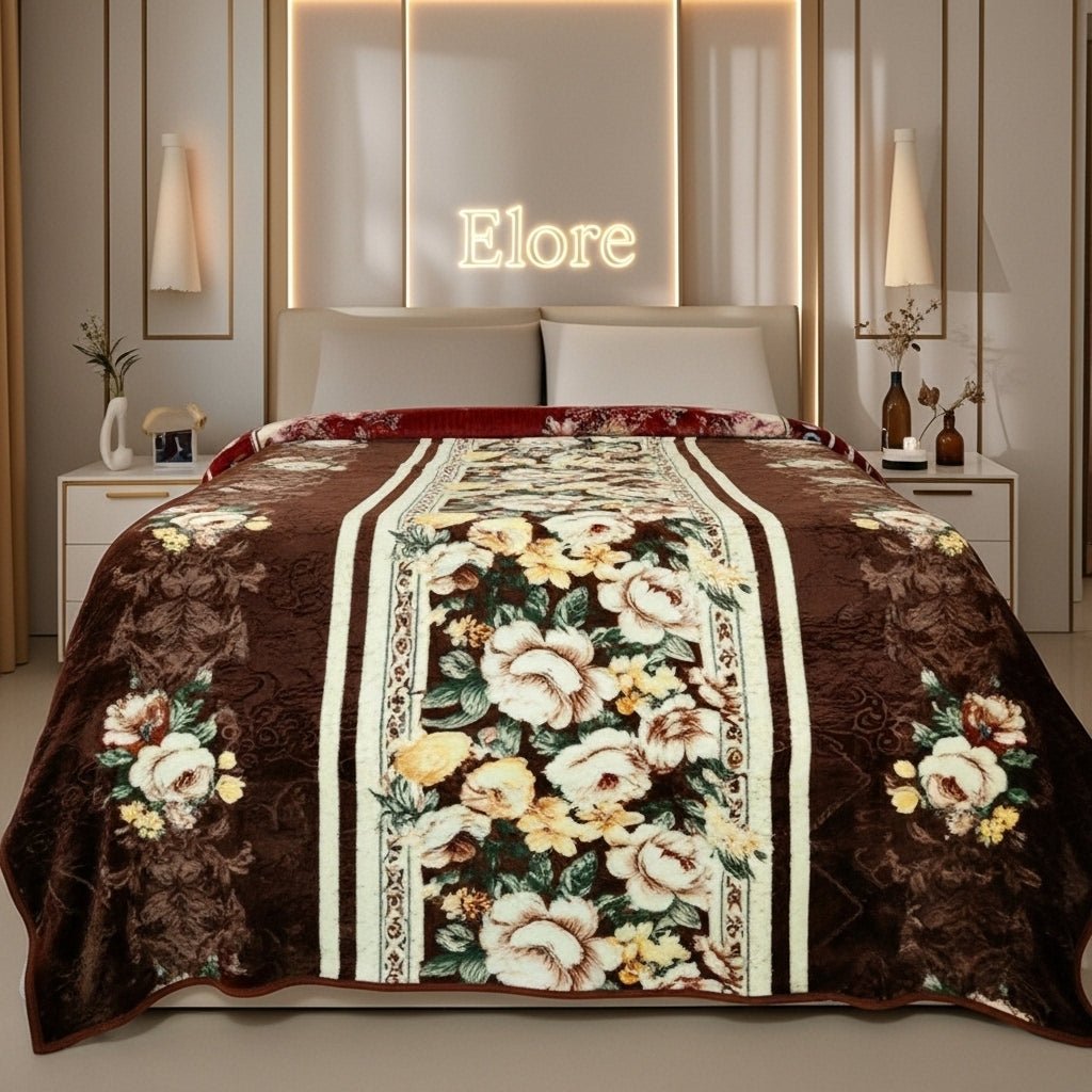 Brown floral fleece blanket on bed in modern bedroom with Elore sign above headboard